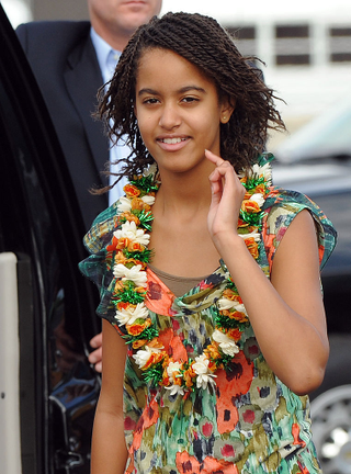 Malia Obama arrives at the Hickam Air Force Base in Honolulu on Dec. 24, 2009, for Christmas vacation.JEWEL SAMAD/AFP/Getty Images